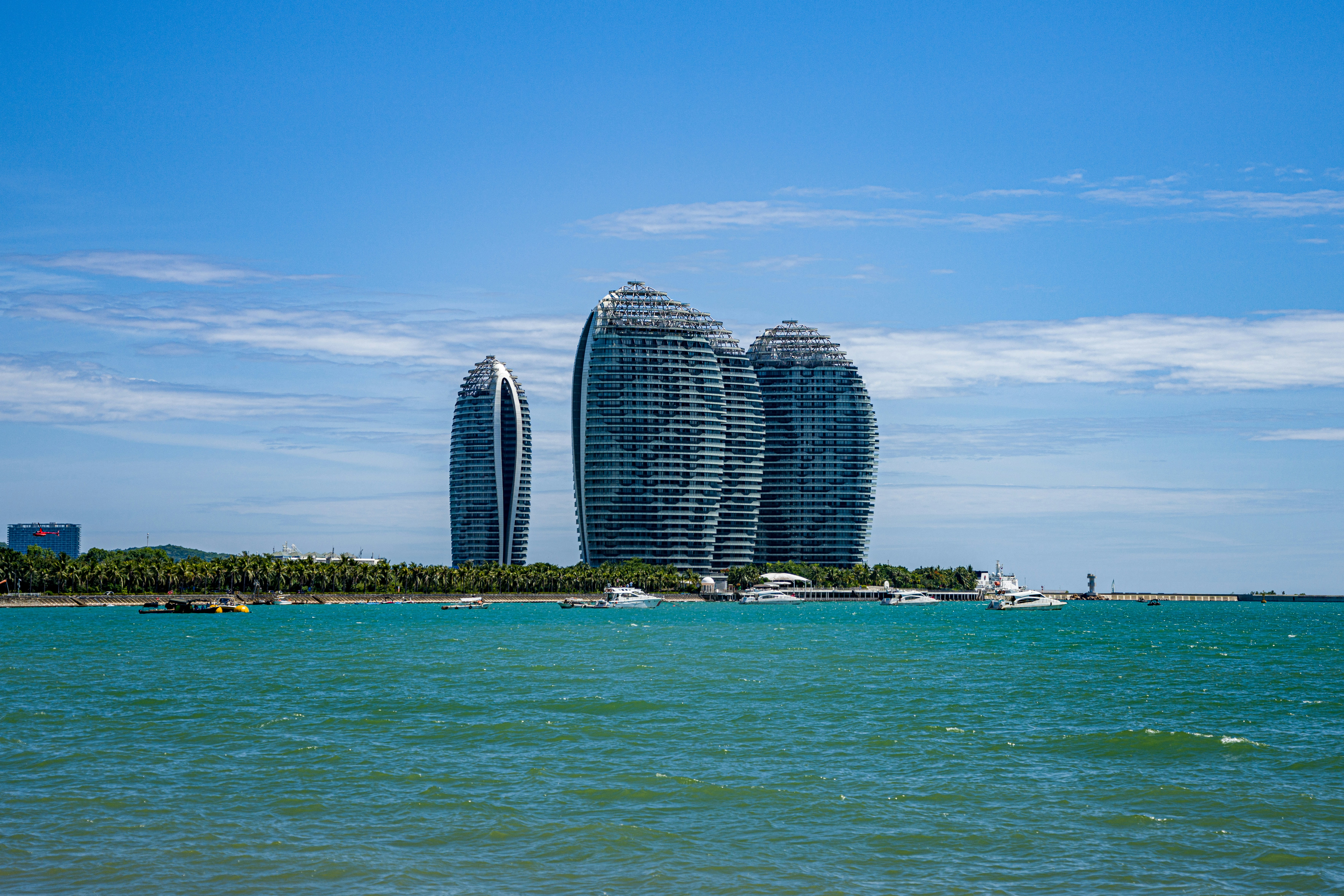city skyline under blue sky during daytime