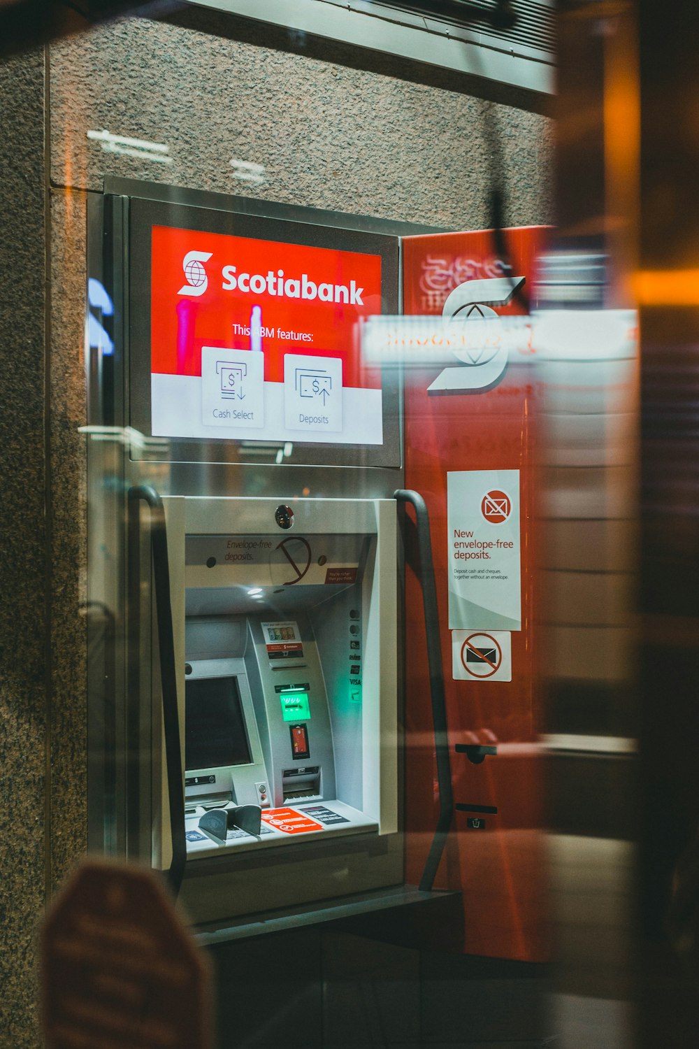 red and white atm machine