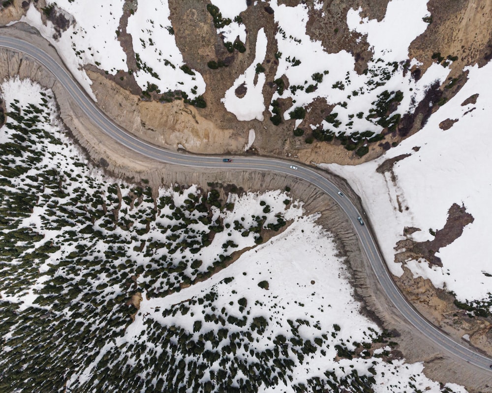 aerial view of road covered with snow