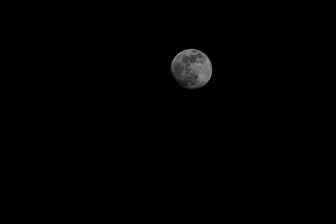 full moon in dark night sky