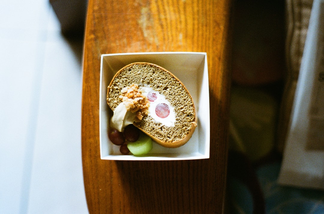 brown and white round pastry on white ceramic plate