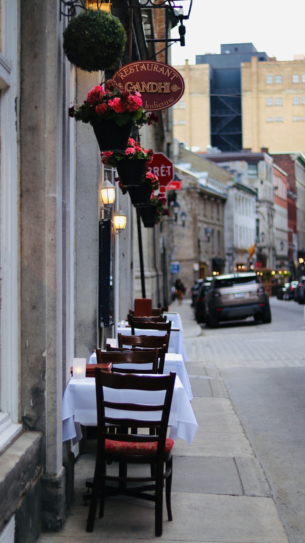 red rose bouquet on brown wooden chair