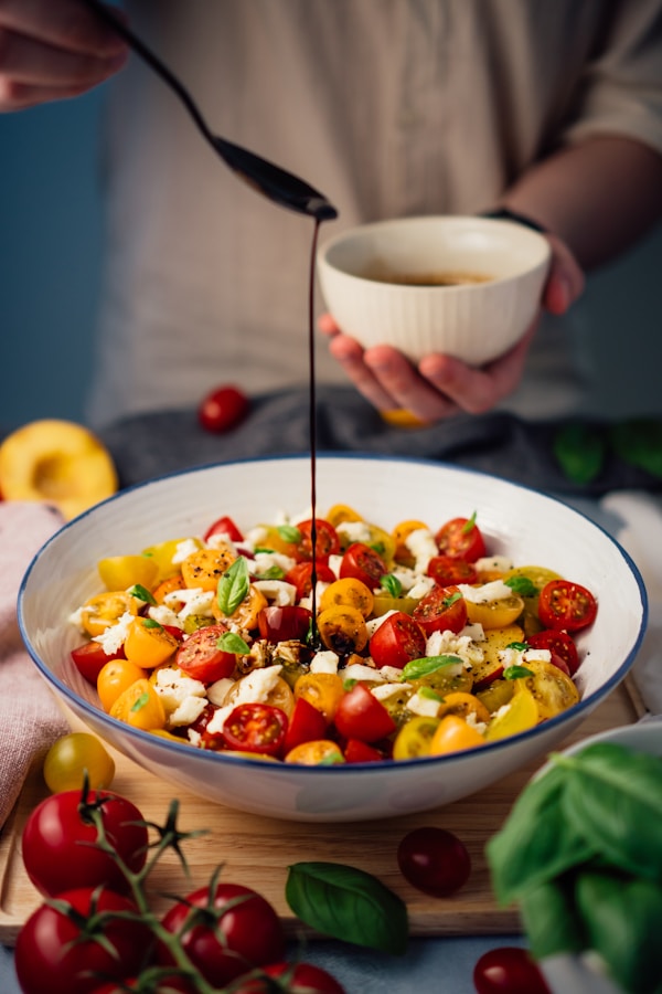 Fruit salad on white ceramic bowl
