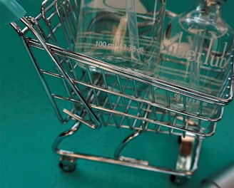 stainless steel shopping cart with white ball