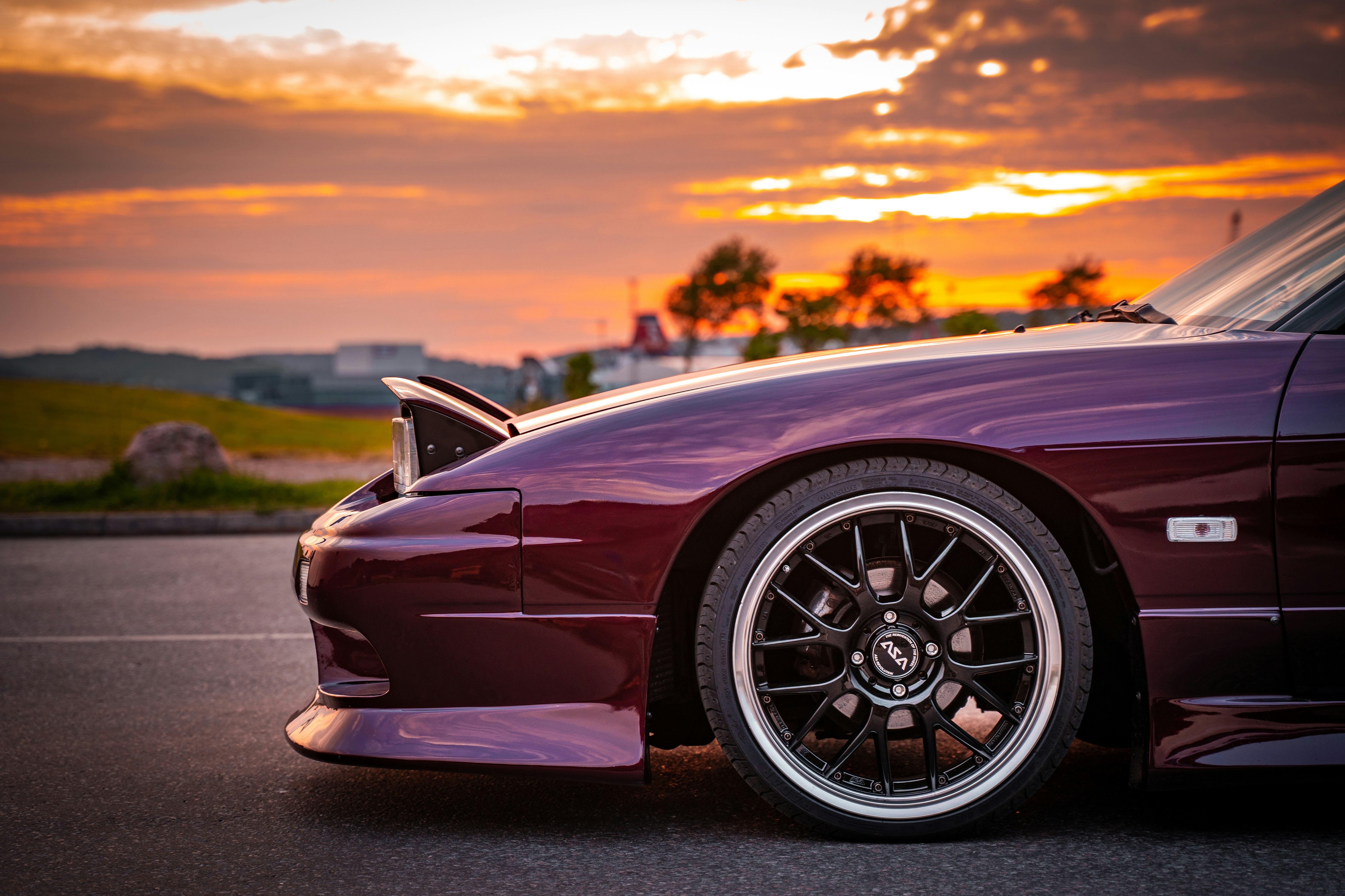 black porsche 911 on road during sunset