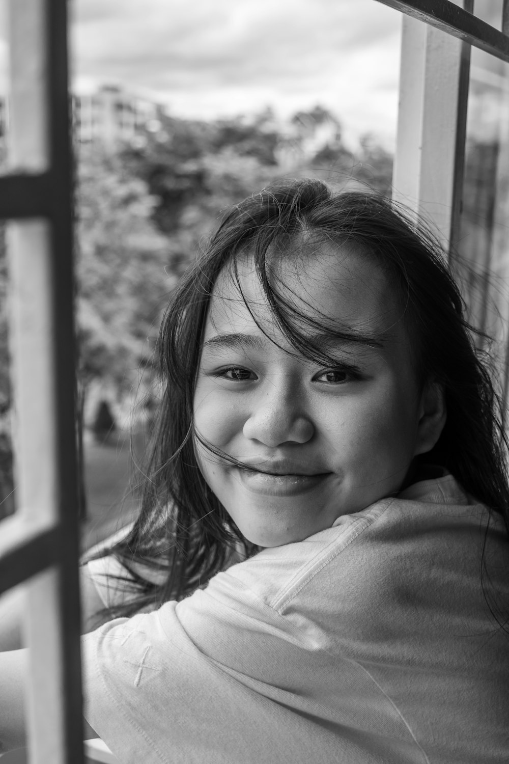 grayscale photo of girl in white shirt