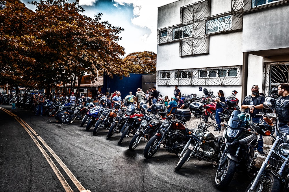 people riding motorcycle on road during daytime