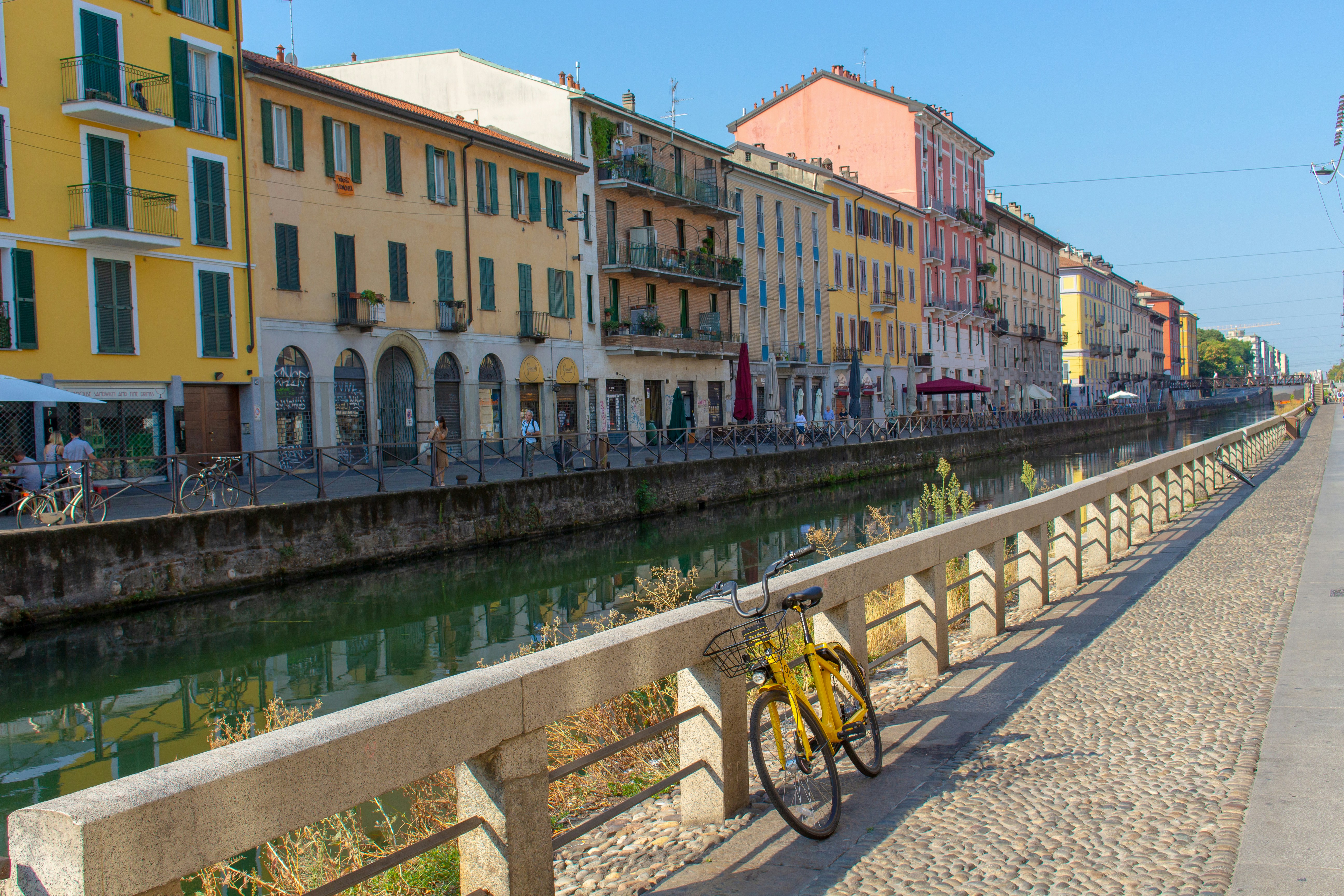 bicycle parked beside the river