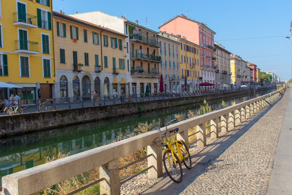 bicycle parked beside the river