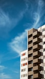 white concrete building under blue sky during daytime