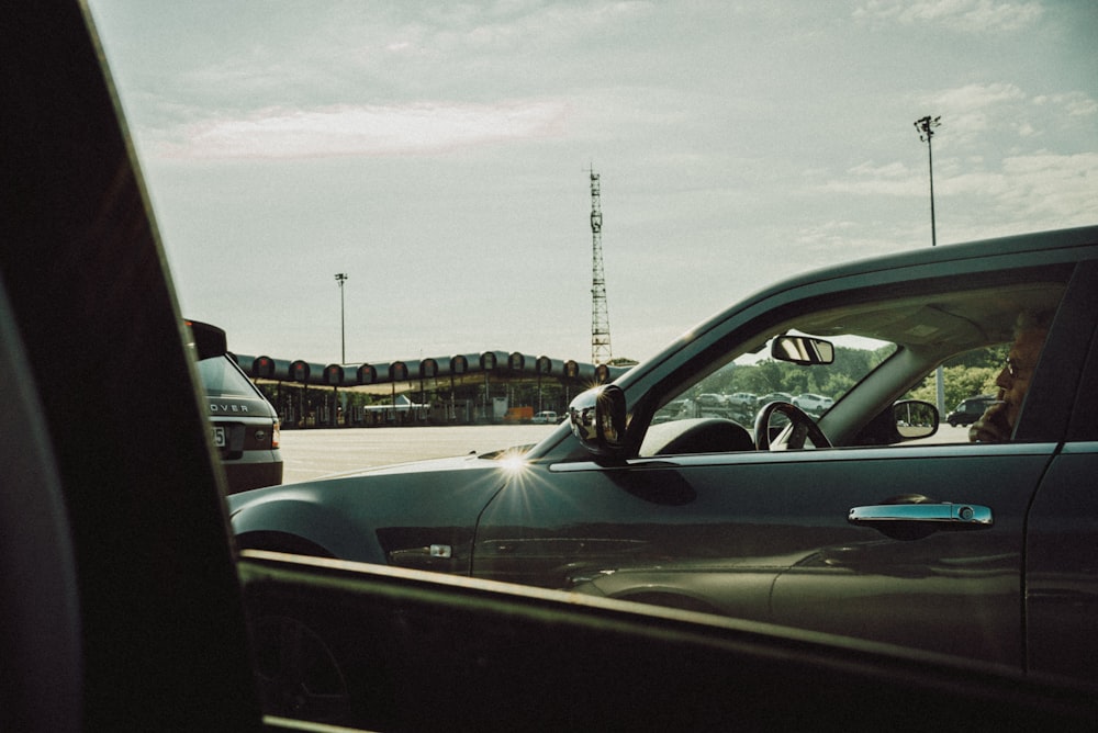 black car on road during daytime