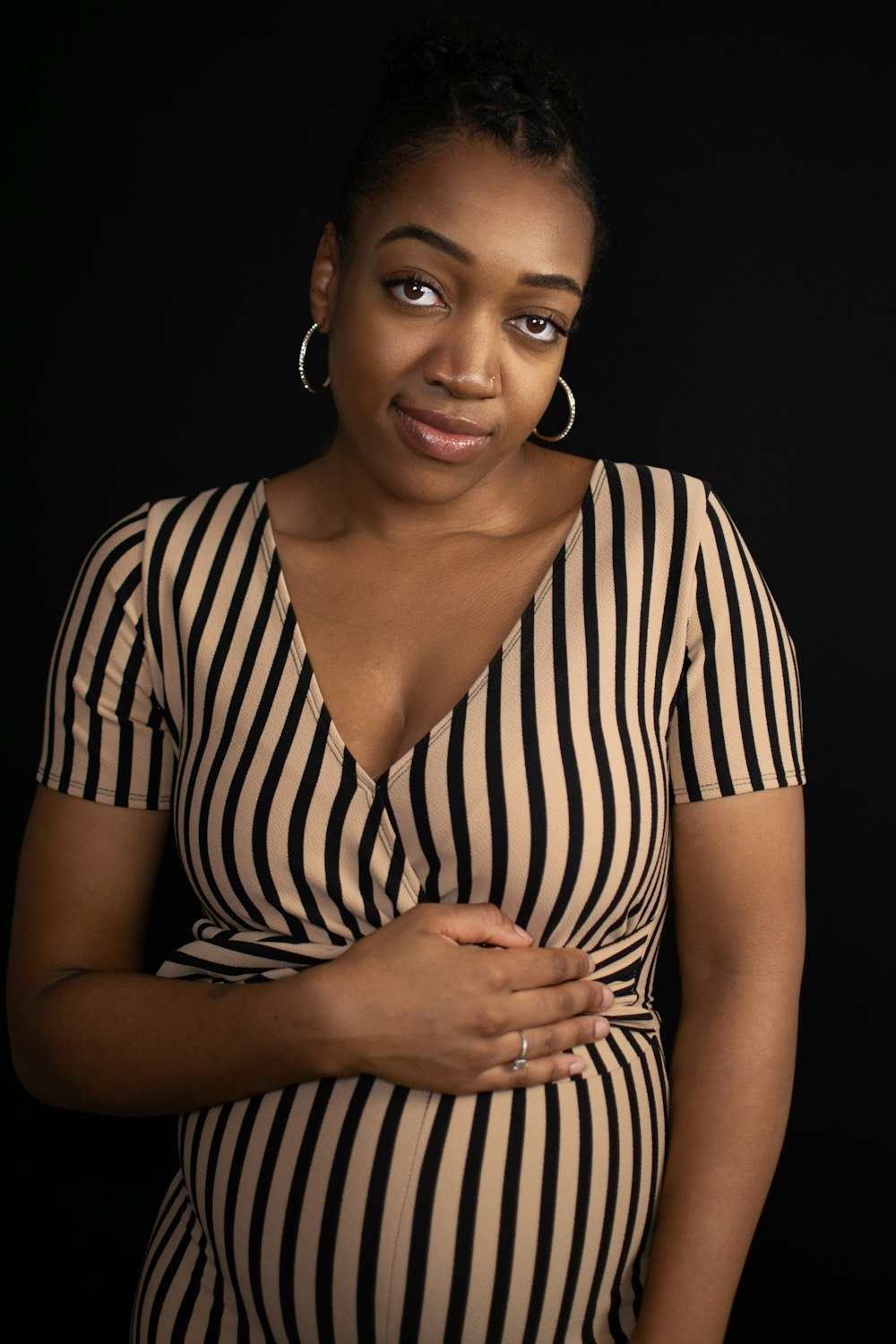 woman in black and white striped shirt