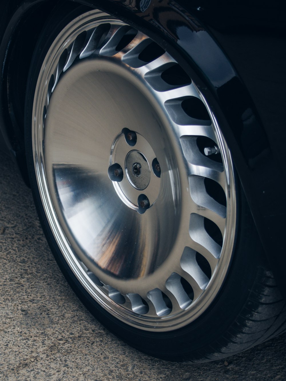 silver 5 spoke car wheel