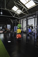 A bright gym space with functional layout and fresh paintwork.
