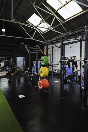 Fitness equipment and accessories neatly organized in a bright gym space
