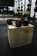 black and gray dumbbells on brown wooden crate