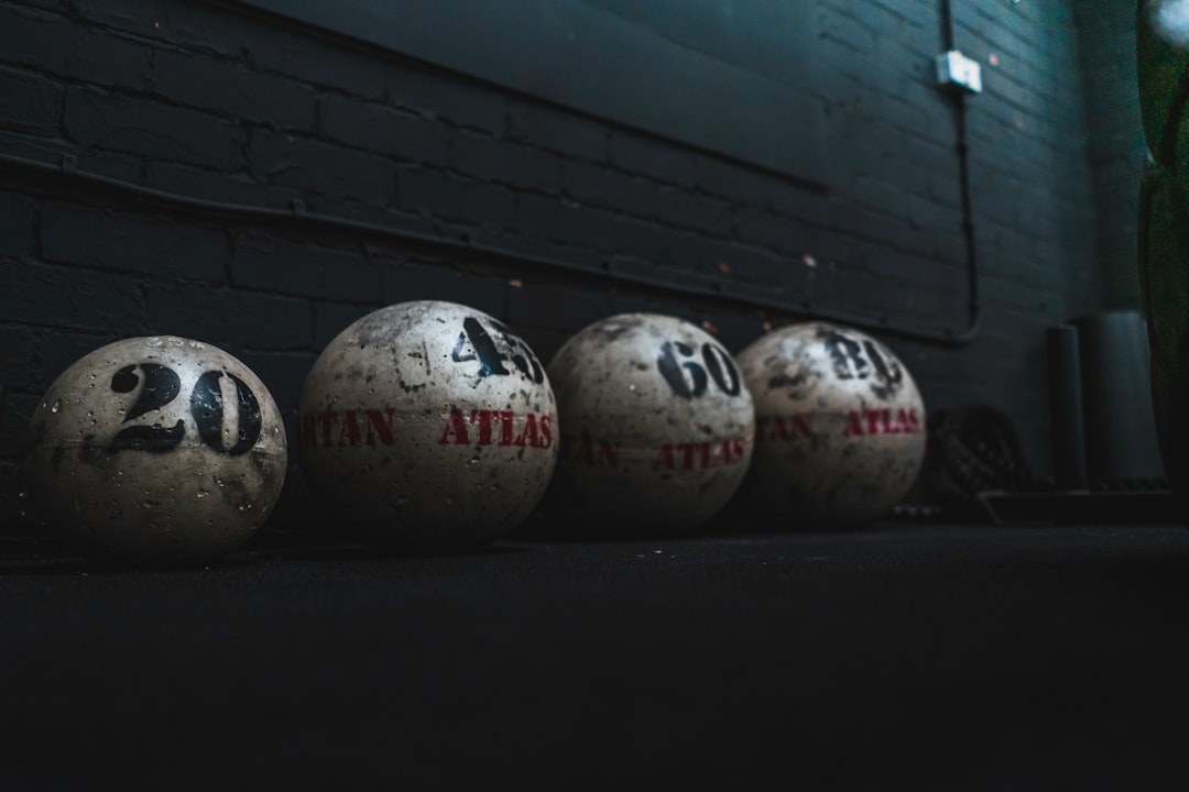 white and red bowling ball