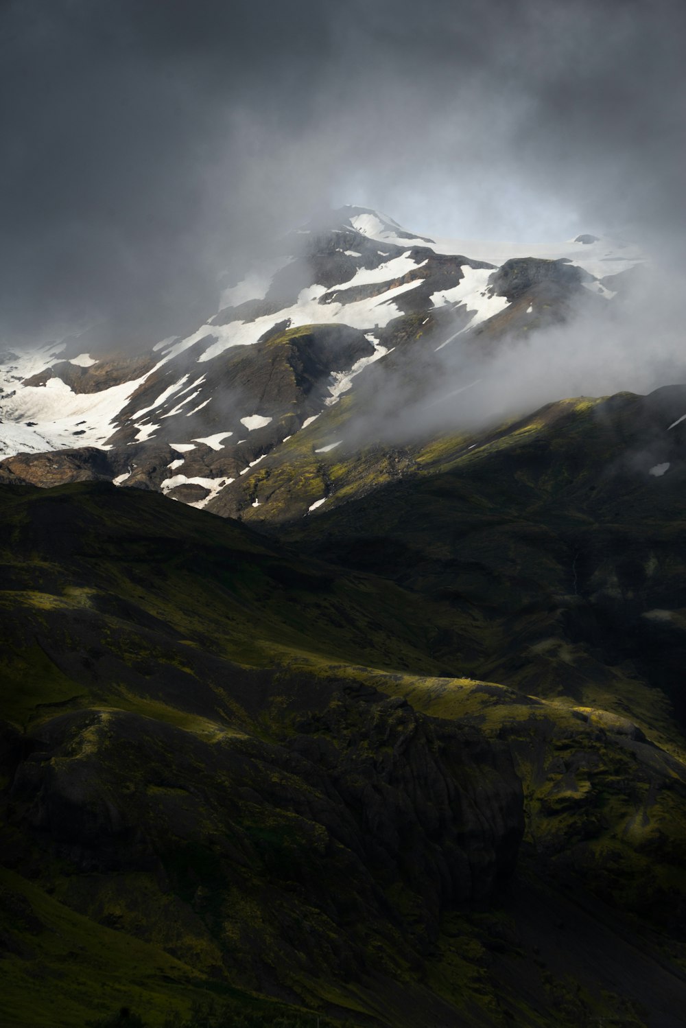 snow covered mountain during daytime