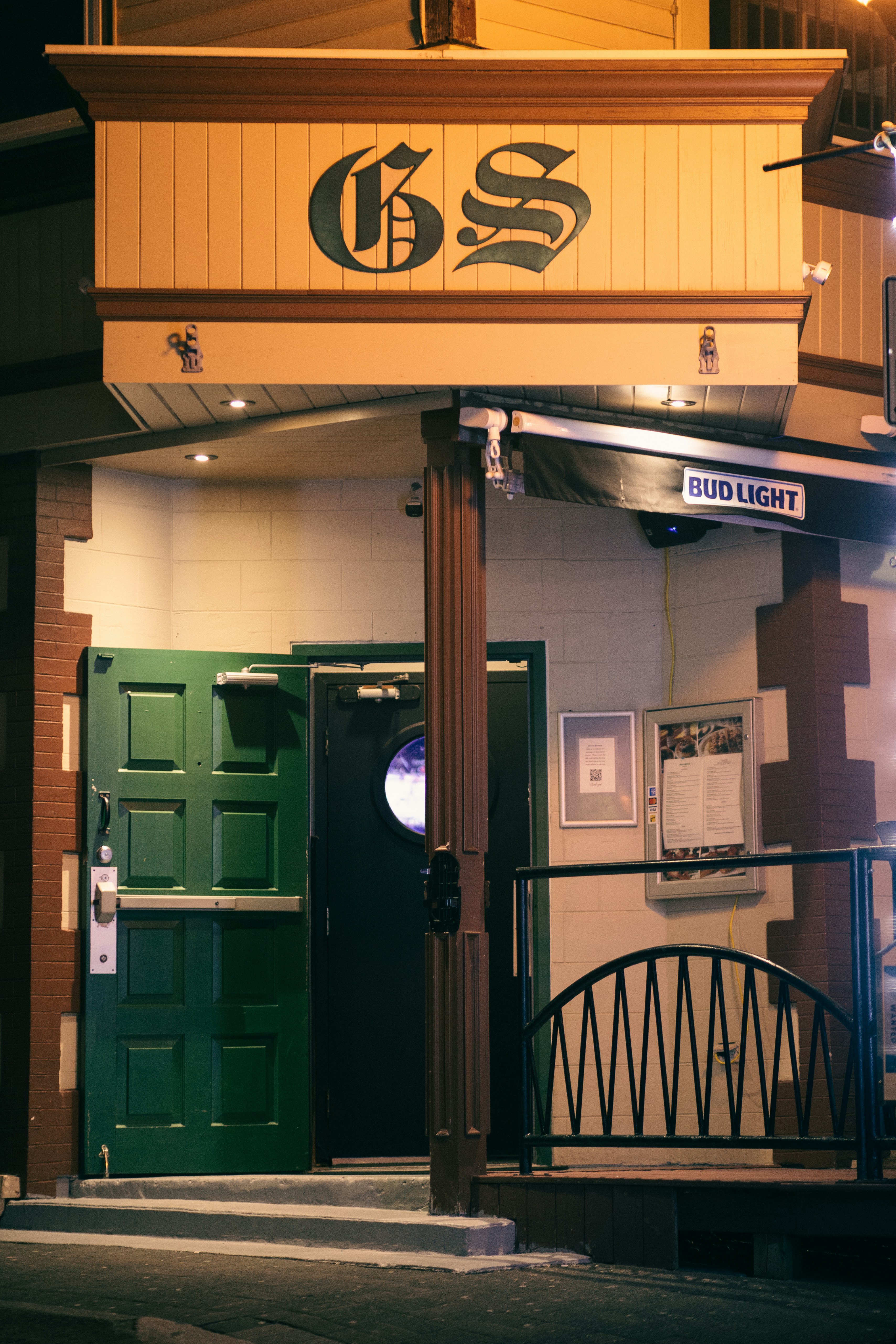 green and white wooden door