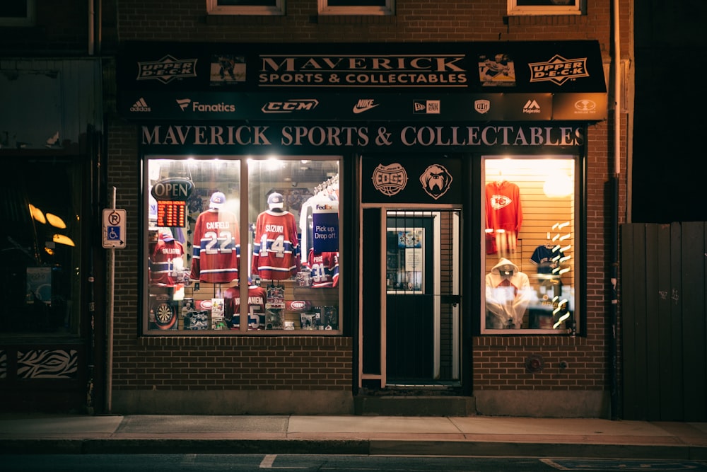 a store front with sports and collectibles in the window