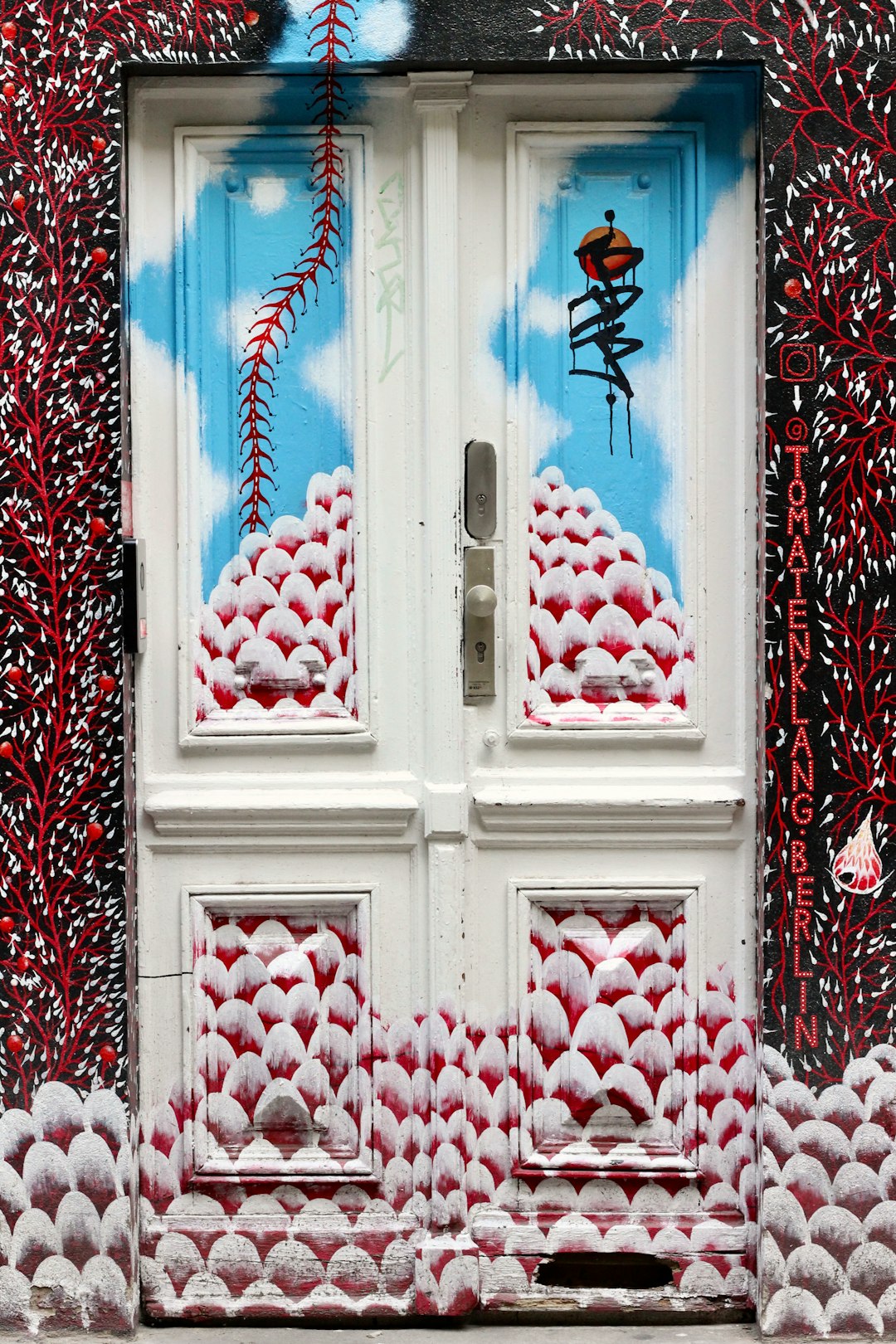 red and blue floral wooden door