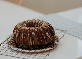 chocolate doughnut on white paper