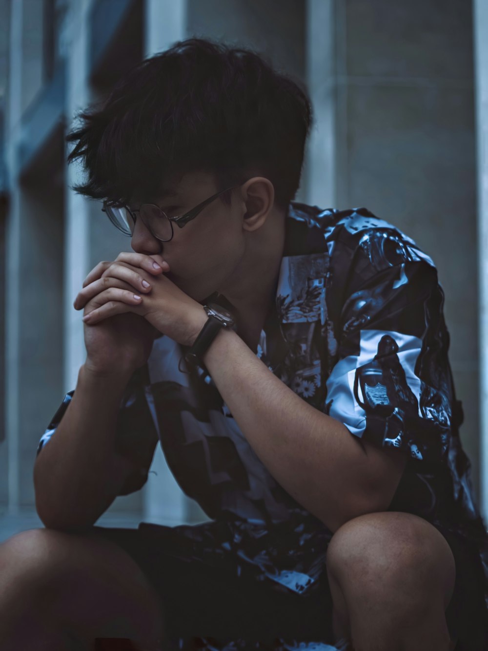 man in blue and white floral button up shirt