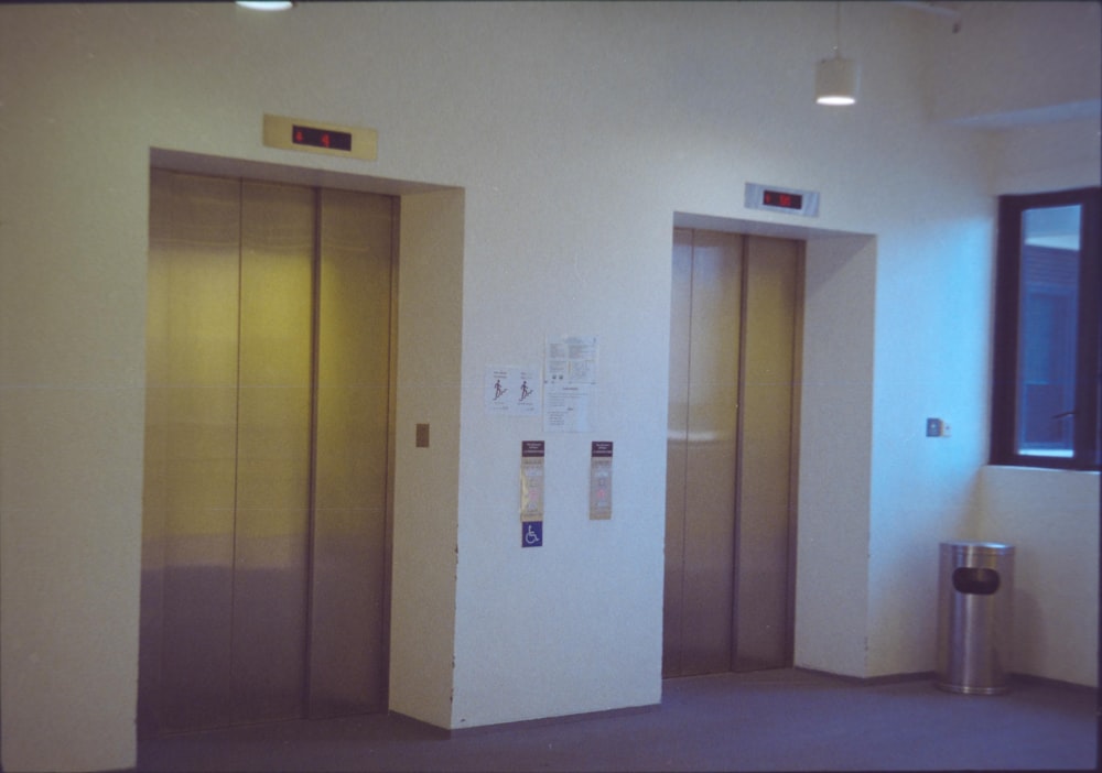 brown wooden door with white wall switch