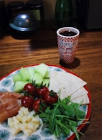 An overhead shot of a café table with various verdino packaging items neatly arranged alongside fresh ingredients.