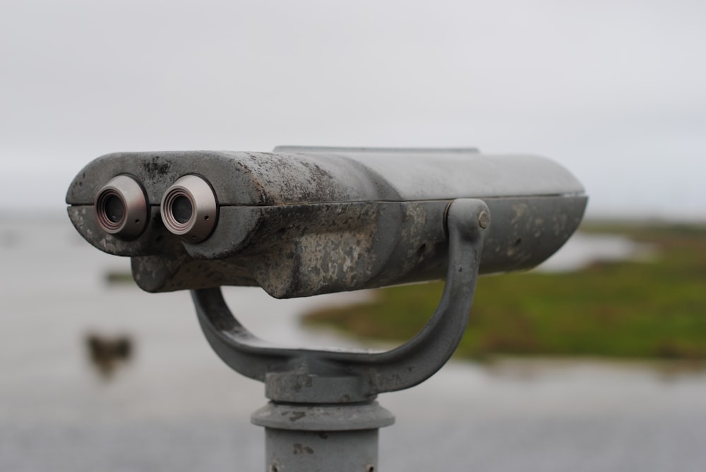 gray and black binoculars in close up photography