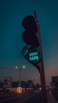 green traffic light turned on during night time