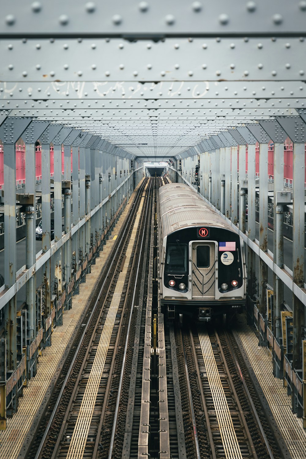 white and red train in train station