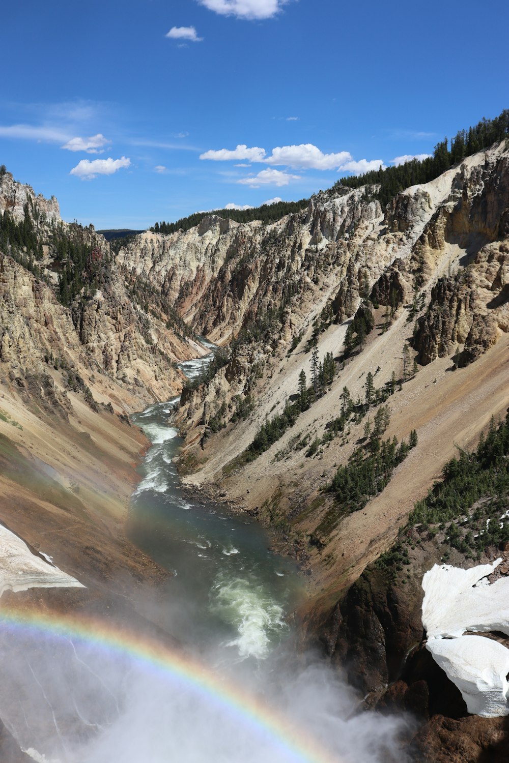 brown rocky mountain under blue sky during daytime