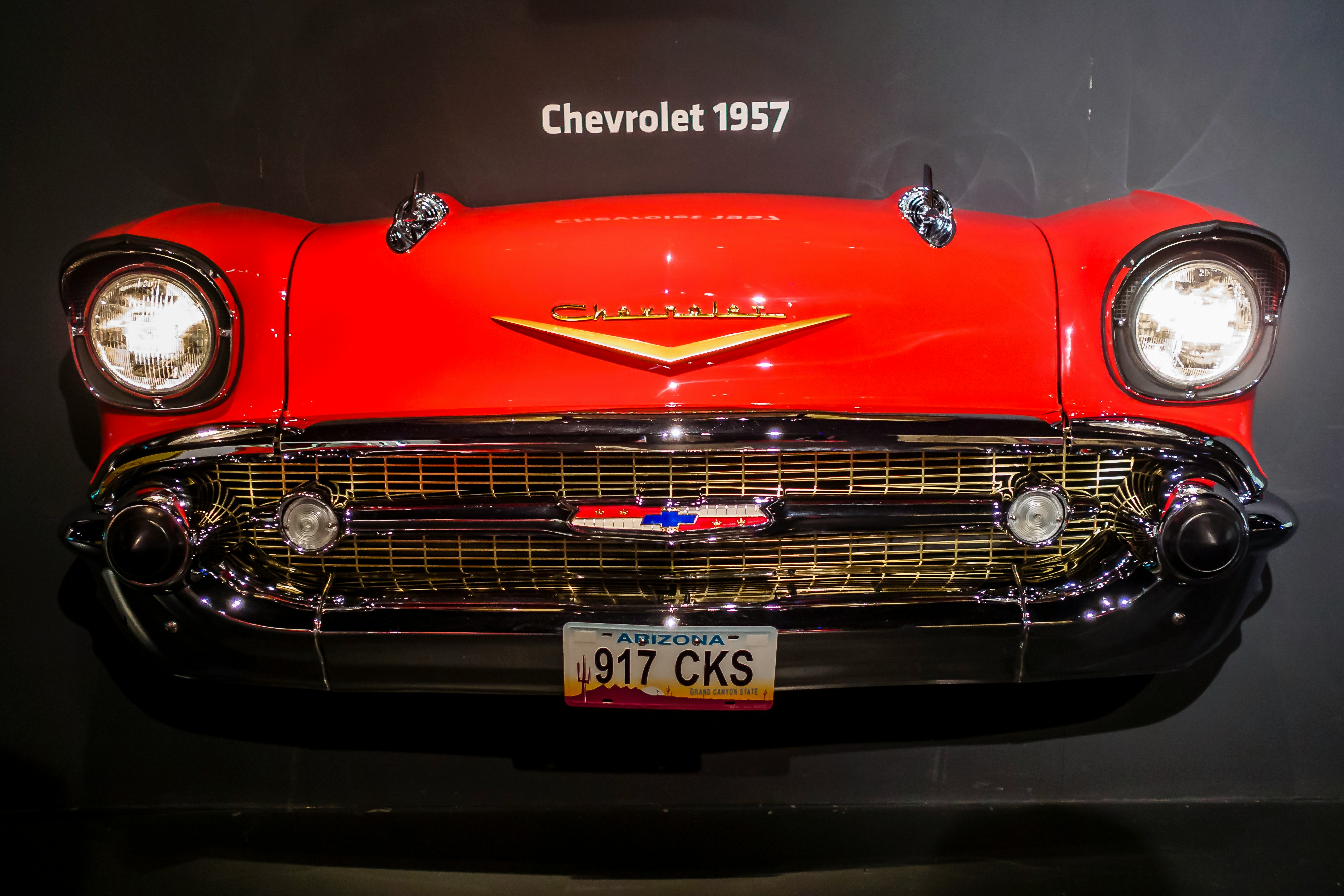 red mercedes benz car in a dark room