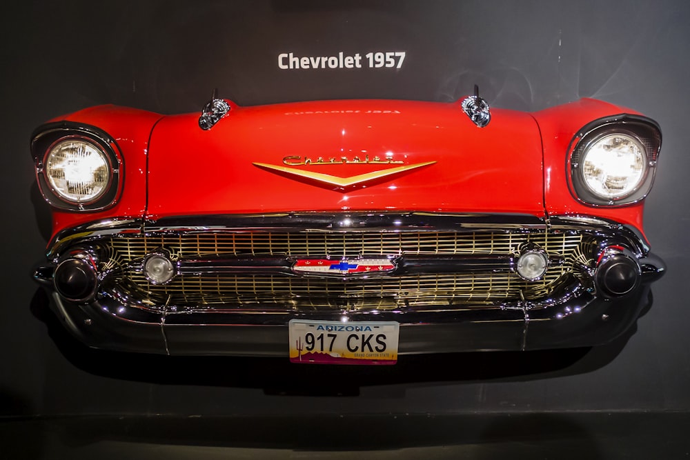 red mercedes benz car in a dark room