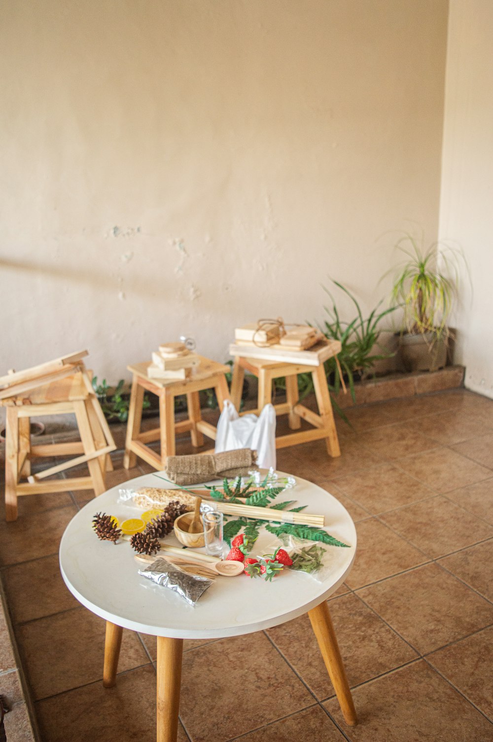 white wooden table with chairs