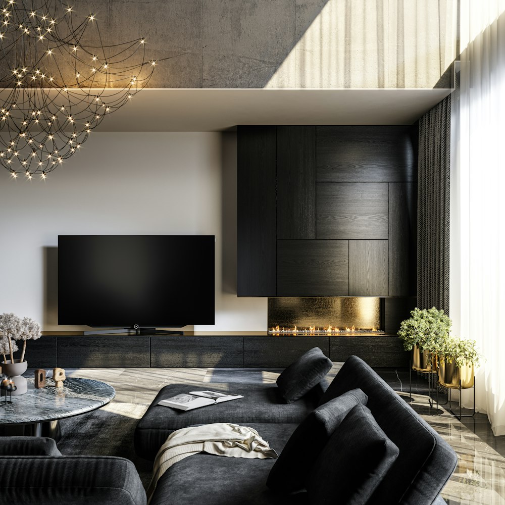 black flat screen tv on brown wooden tv rack