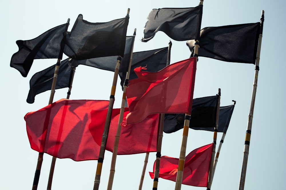 black and red flags during daytime