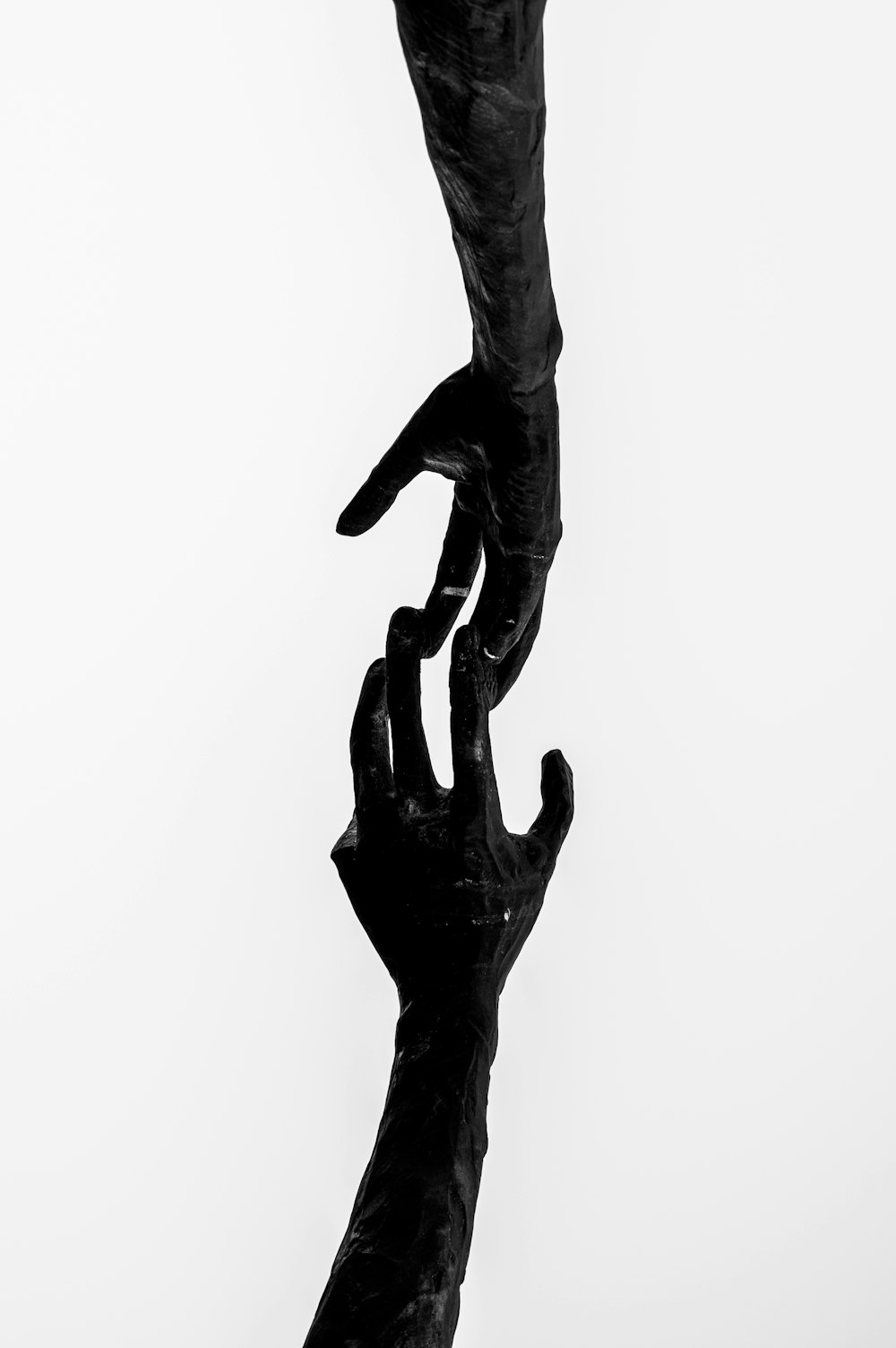 black and white human statue