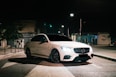 white mercedes benz coupe on road during night time