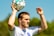 man in white nike soccer jersey holding soccer ball