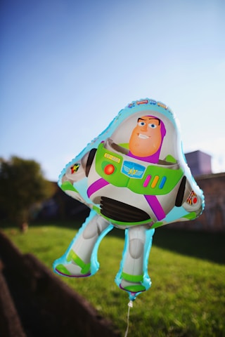 white green and yellow plush toy