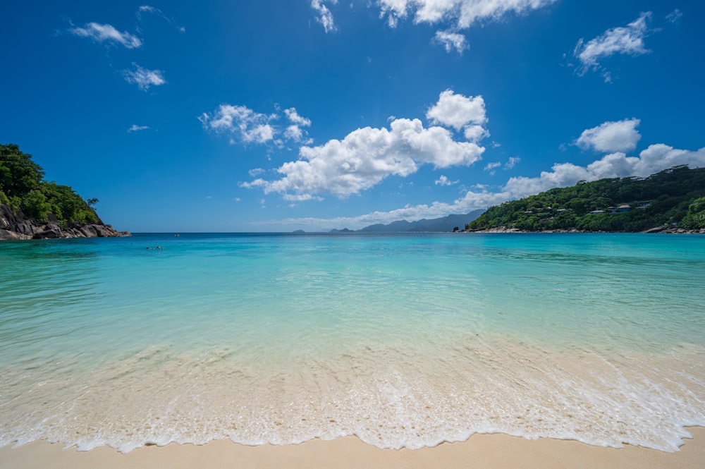 blue sea under blue sky during daytime