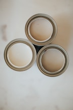 2 round silver and gold colored coins