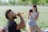 man in black crew neck t-shirt drinking beer