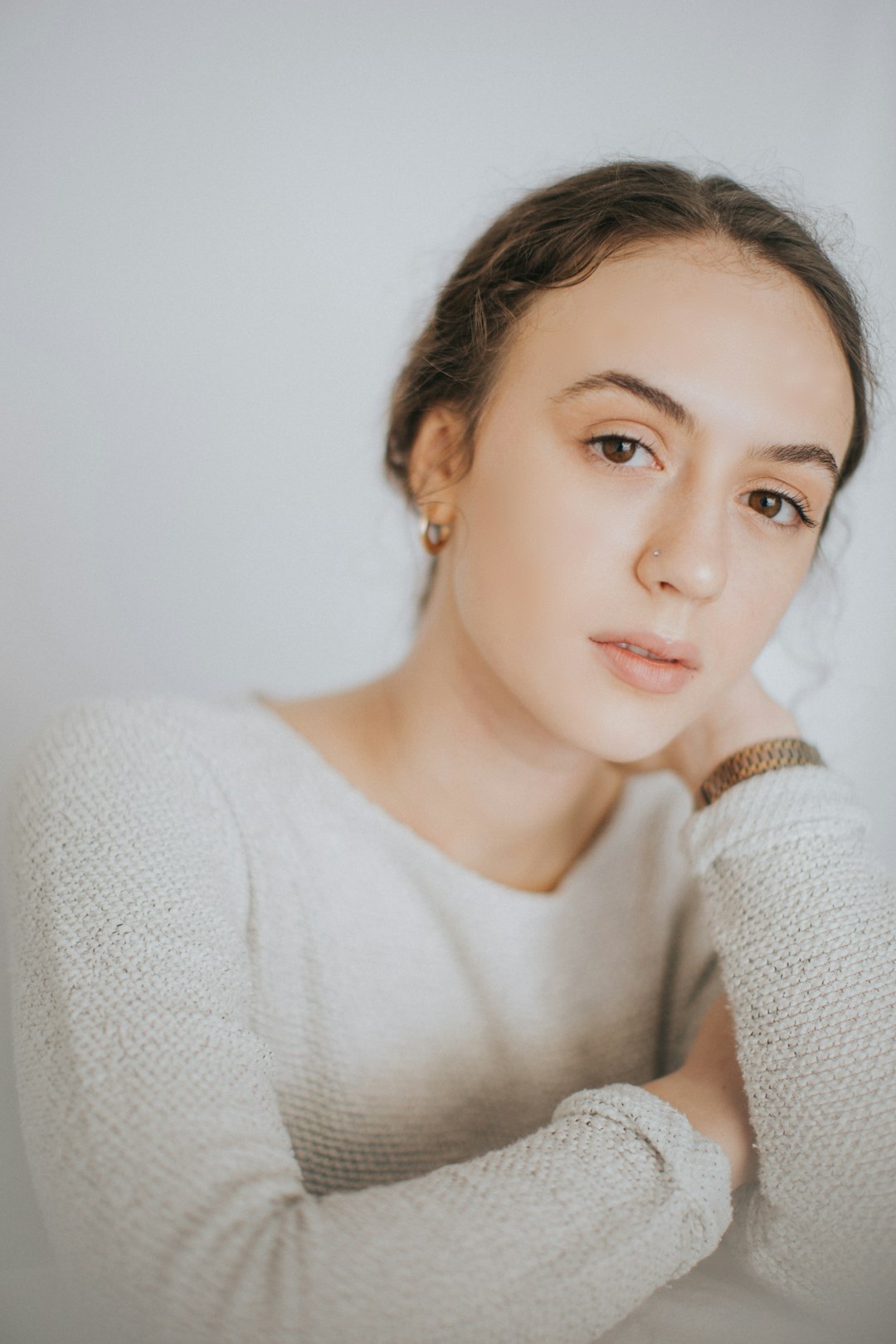 woman in white knit sweater