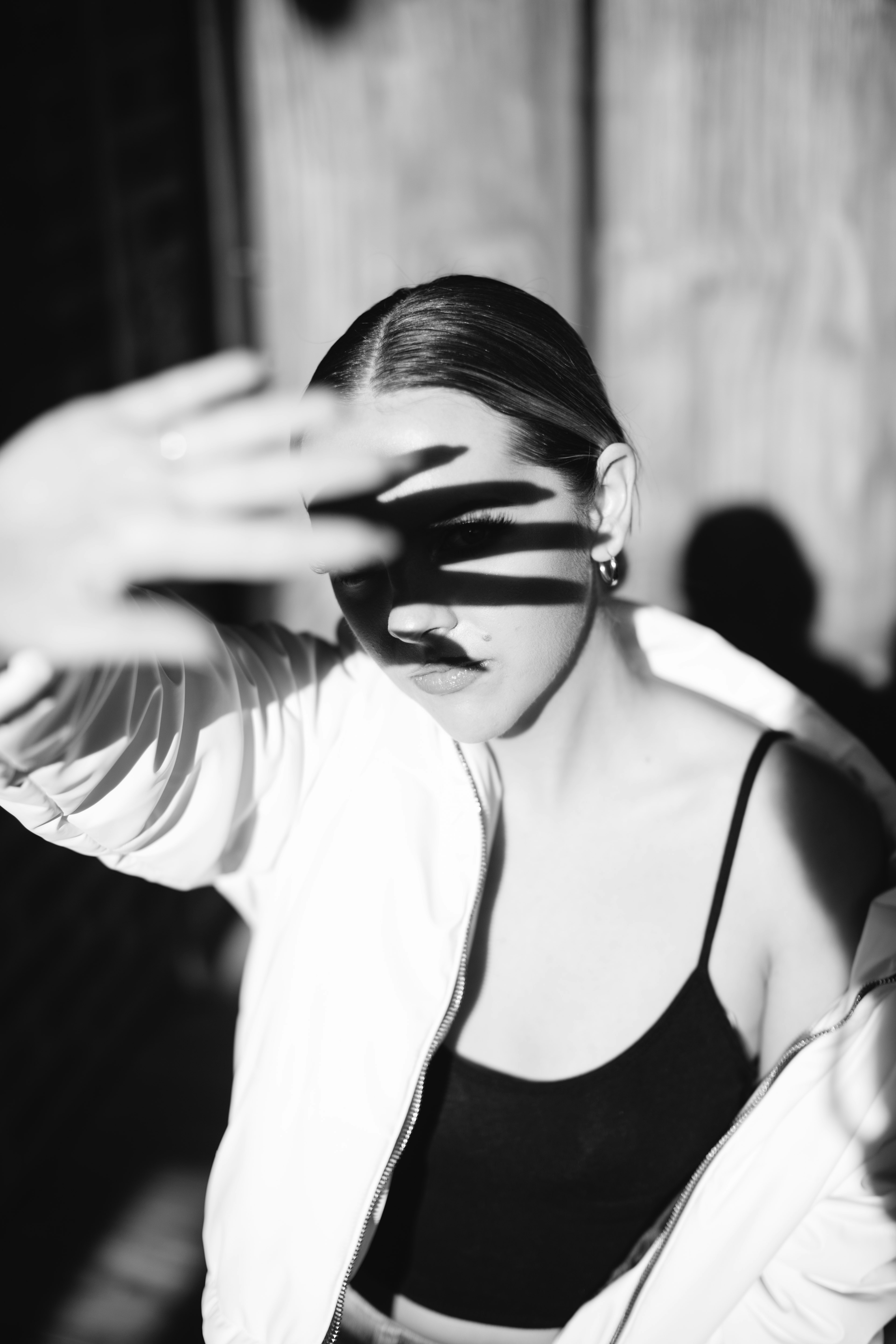 woman in black tank top wearing black sunglasses