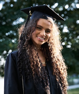 woman in black academic gown