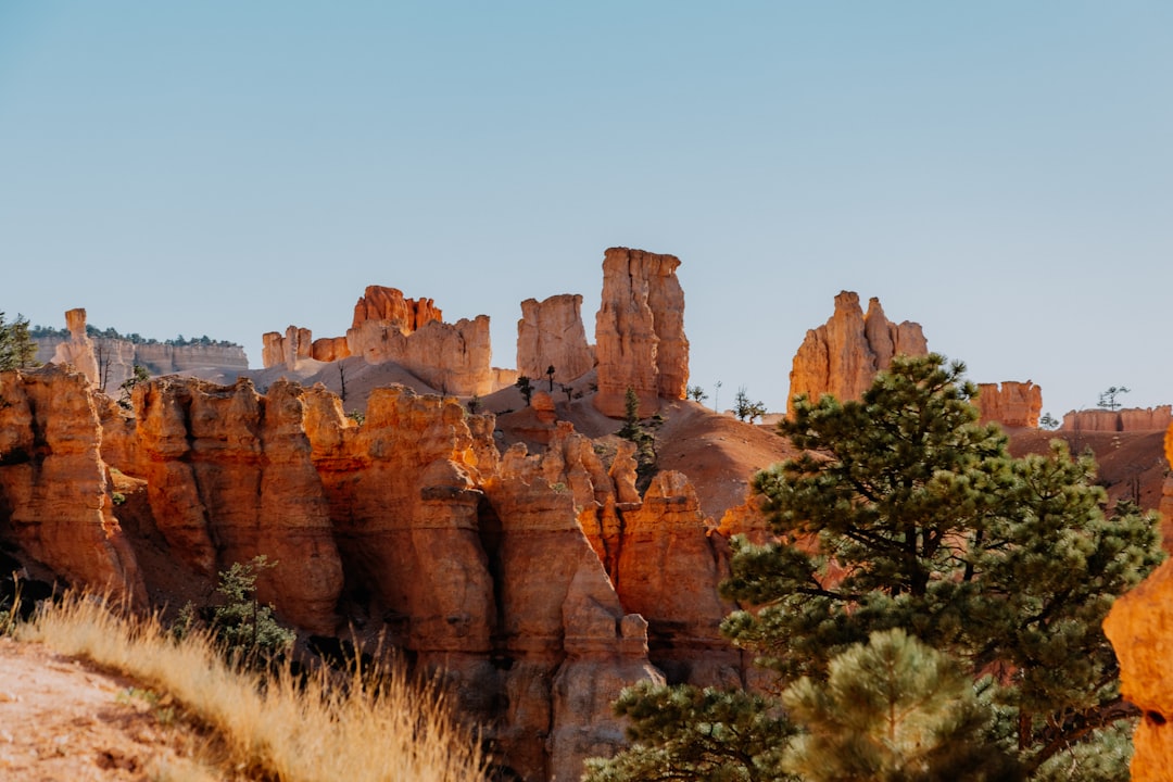 brown rock formation under blue sky during daytime