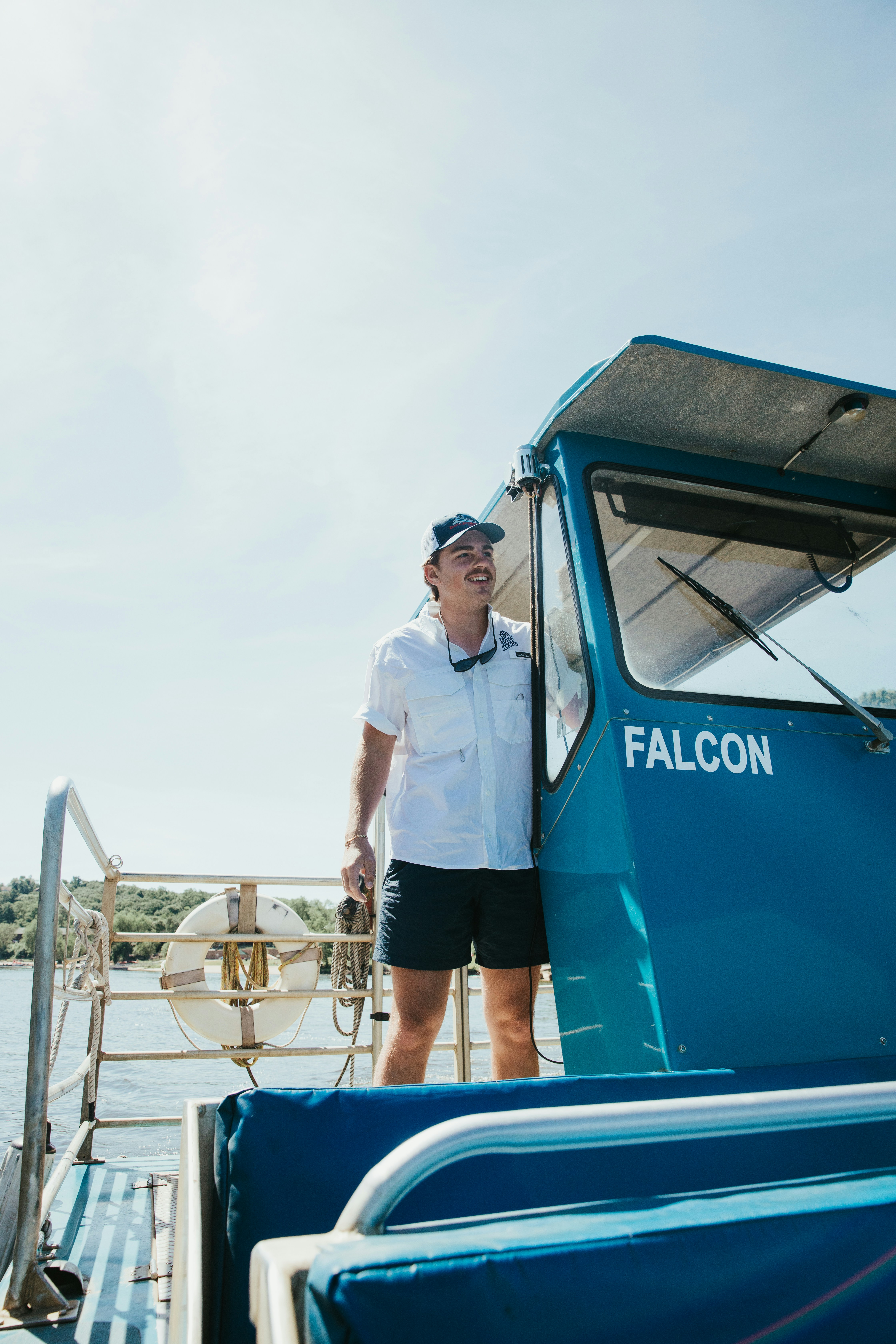 a man standing on a boat